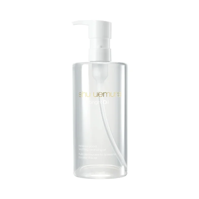 A clear, cylindrical 450ml bottle of Shu Uemura brightOil soothing cleansing oil.